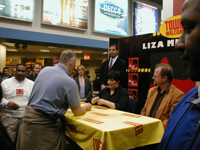 Liza signs my CD